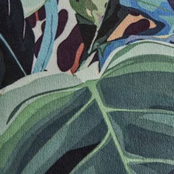 Coussin à franges Toucan et Monstera
