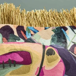 Coussin à franges Toucan et Monstera