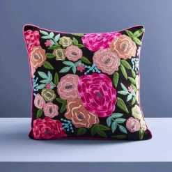 Coussin Lotte, noir avec motif floral coloré