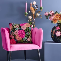 Coussin Lotte, noir avec motif floral coloré
