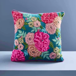 Coussin Lotte, vert avec motif floral coloré