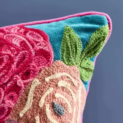 Coussin Lotte, vert avec motif floral coloré