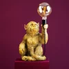 Lampe de table singe Abu, or