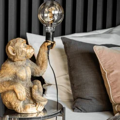 Lampe de table singe Abu, or